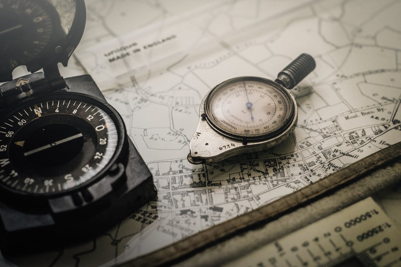 Mastering the First Impression: Your intriguing post title goes here A vintage compass and navigation instrument on an old map, showcasing precision tools for exploration.